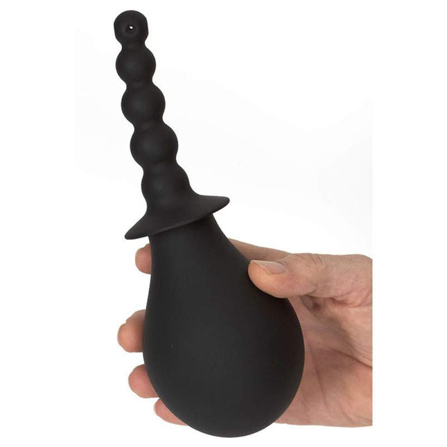 Black Silicone Douche with male hand holding