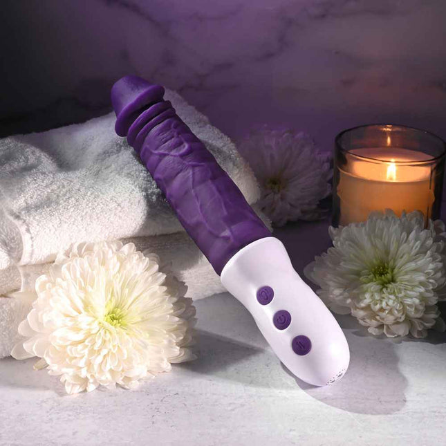 Evolved PLUM THRUST Vibrating Dildo with White flowers and Candle