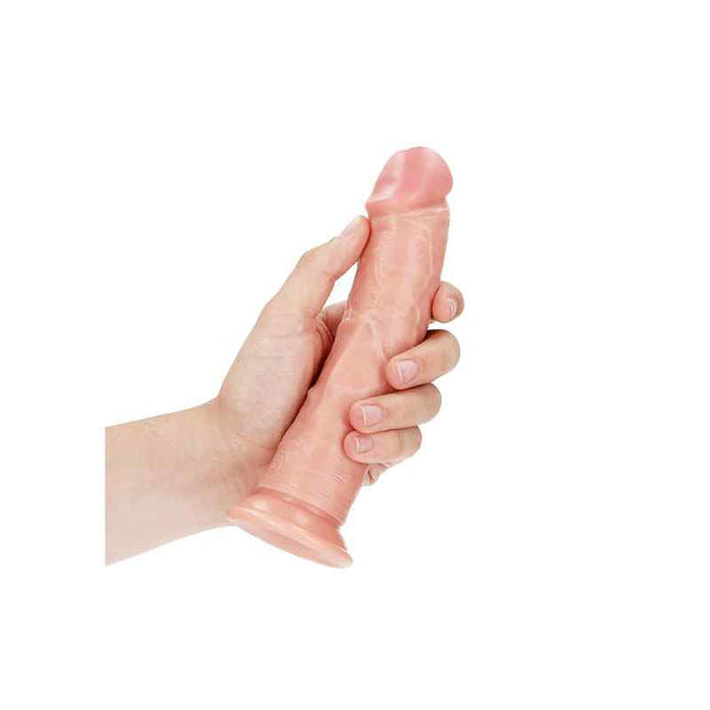 Female Hand Holding Flesh REALROCK  7 Inch Realistic Curved Suction Cup Dildo