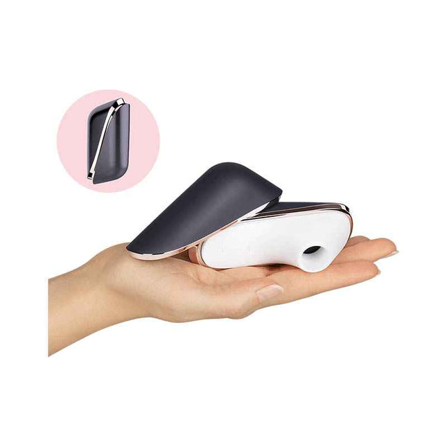 Female Hand Holding Satisfyer Pro Traveler Clitoral Stimulator