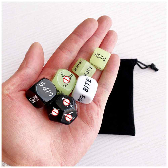 Female Hand holding 6pcs Sex Dice Game Set