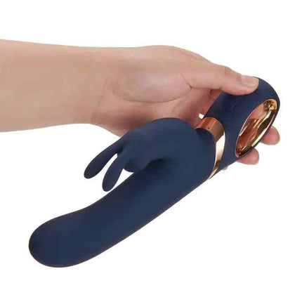 Female Hand Holding Gold Plating Rabbit Vibrator Sex Toy