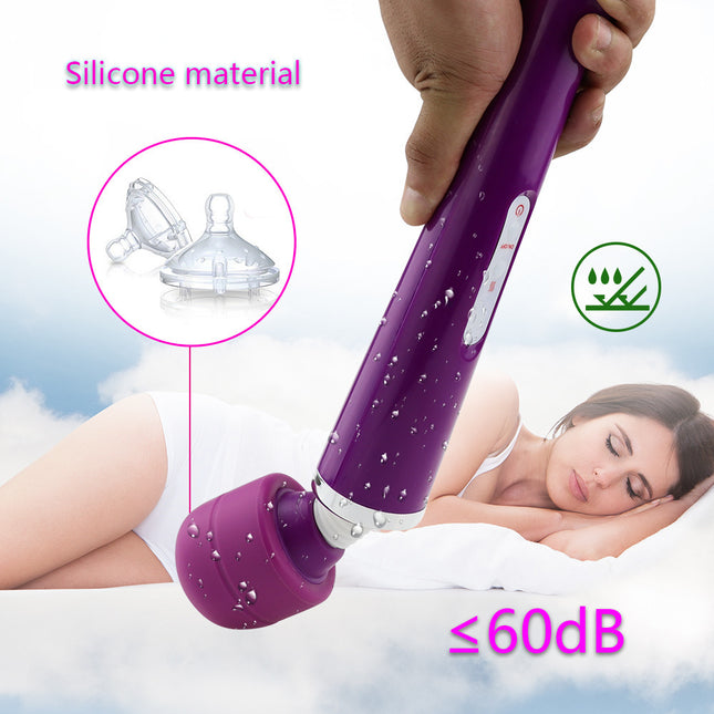 Female Laying in Bed with Female Sex Toy Wand Massager in front of her