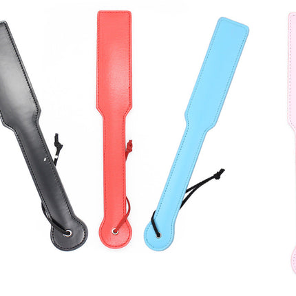 Four Leather Spanking Paddles in Red Black Pink and Light Blue