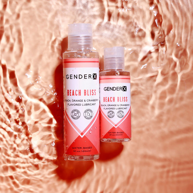 Gender X Beach Bliss Peach, Orange & Cranberry Flavoured Water Based Lubricant - 120 ml Bottle with 60ml Bottle side by Side