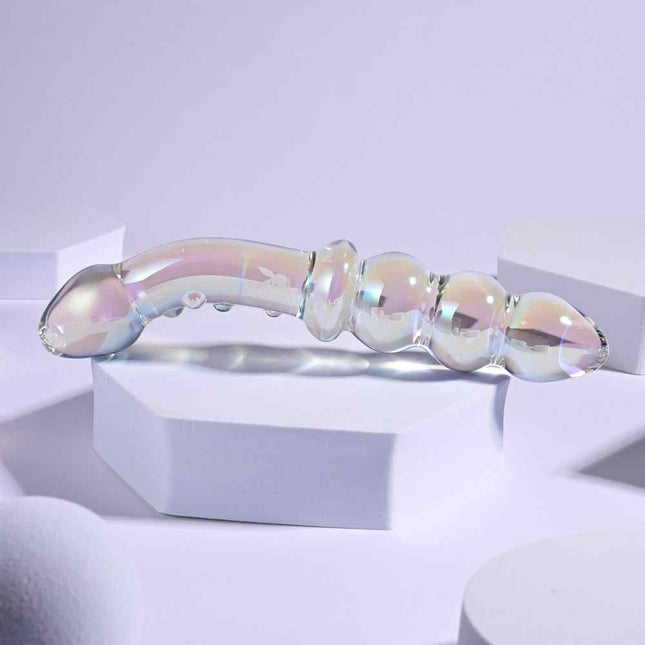 Glass Double Ended Dildo 6.5 Inch laying on white stand