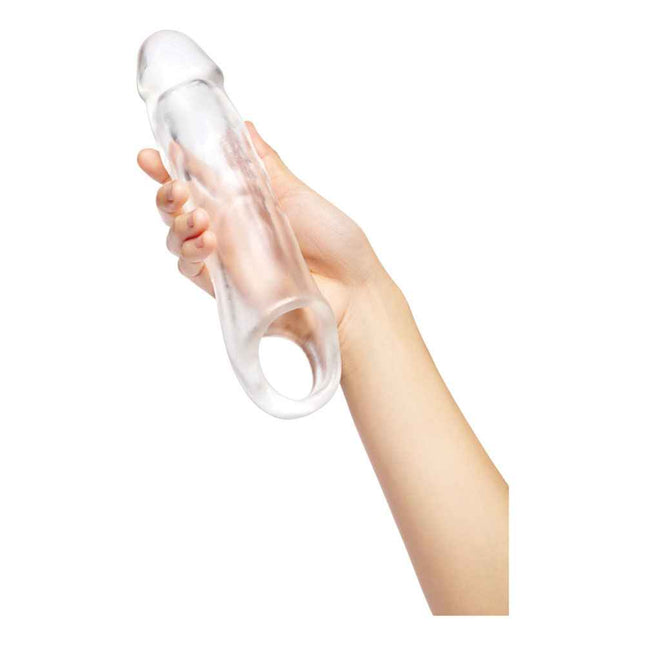 Hand Holding Clear Size Up 3 Inch See-Thru Penis Extender with Ball Loop