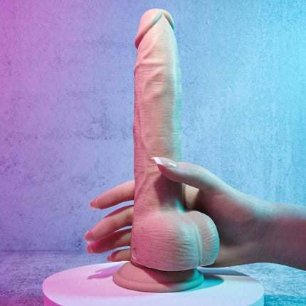 Hand Holding Evolved THRUST IN ME LIGHT Dildo