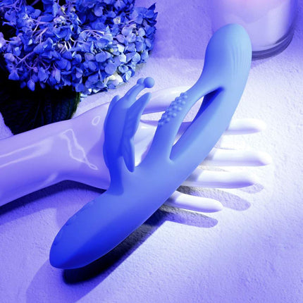 Hand holding Purple Evolved BUTTERFLY DREAMS Vibrator