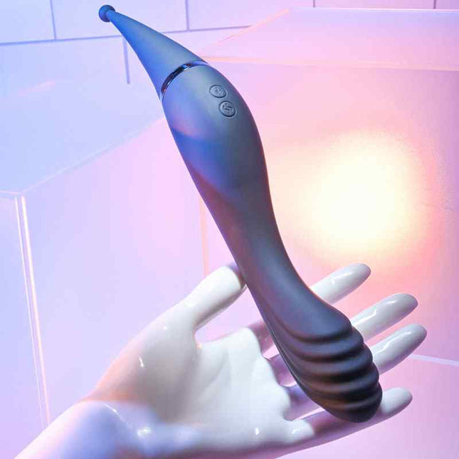 Hand holding sex toy Evolved TANTALIZING TEASER Dual Ended Vibrator