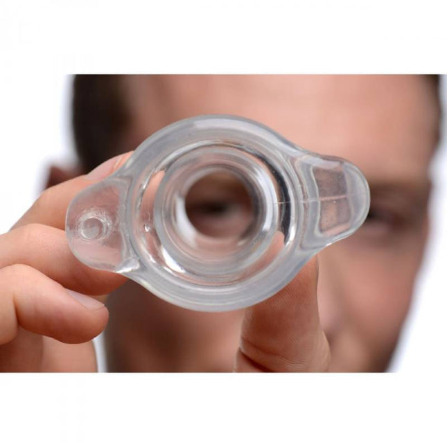 Man Holding Clear Hollow Anal Plug