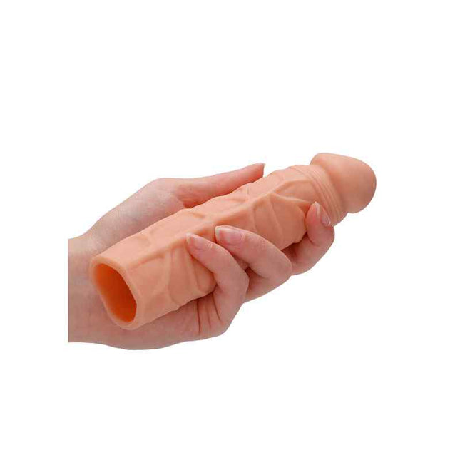 Mens Hand Holding REALROCK 7 Inch Penis Extender Flesh