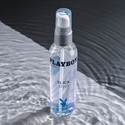 Playboy Pleasure SLICK H2O Water Based Lubricant 120 ml with Black and Grey Background