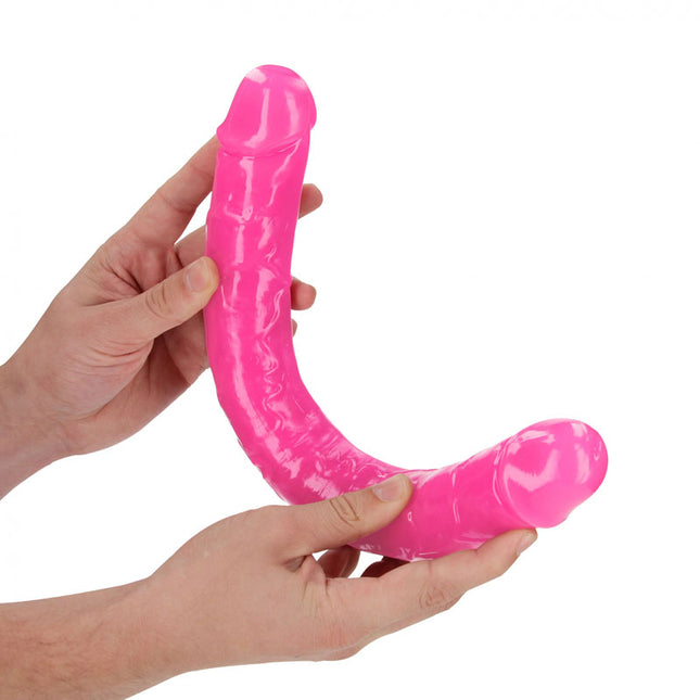 hand holding REALROCK 15 Inch Curved Double Ended Dildo - Pink